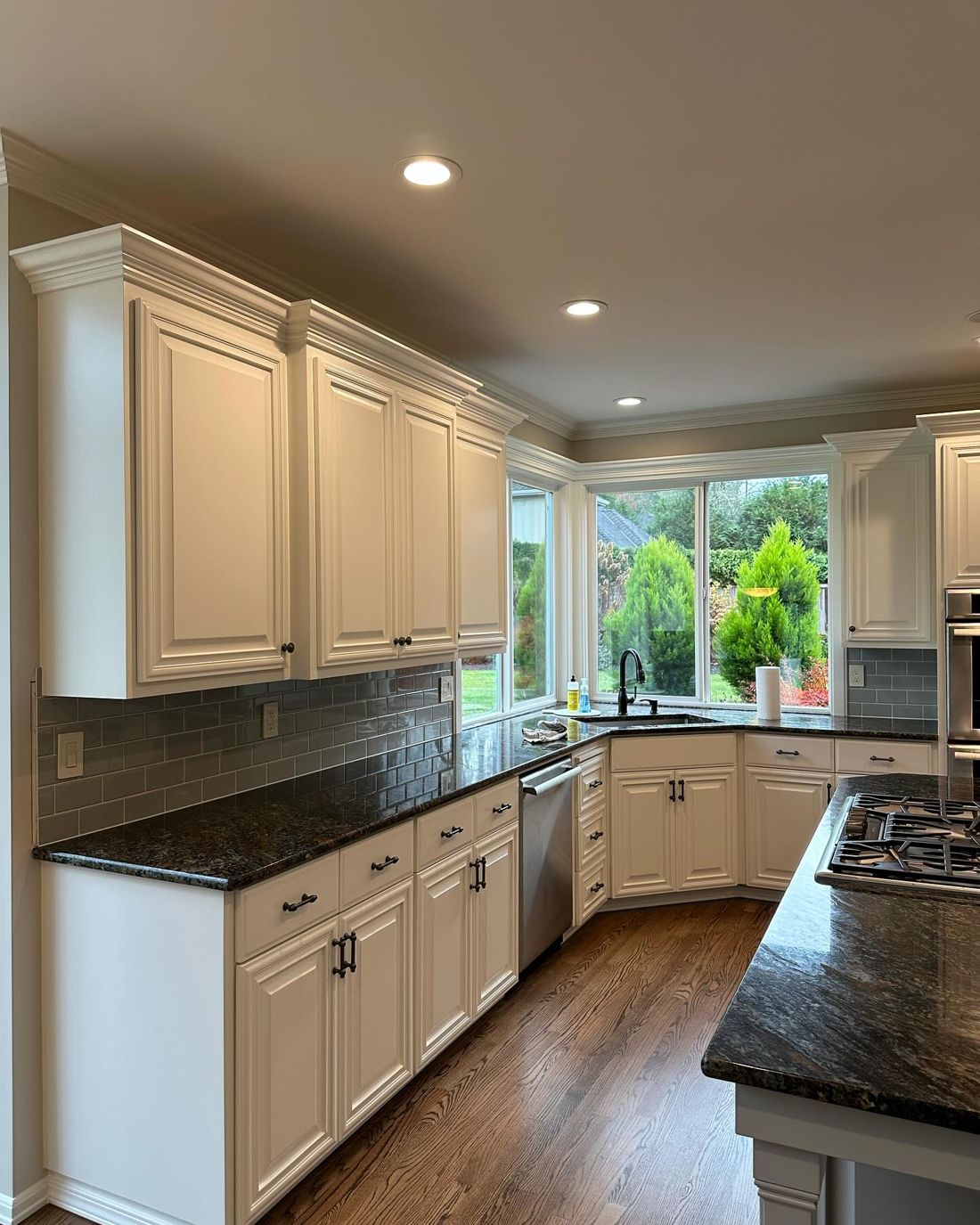 Kitchen after: cabinets painted white